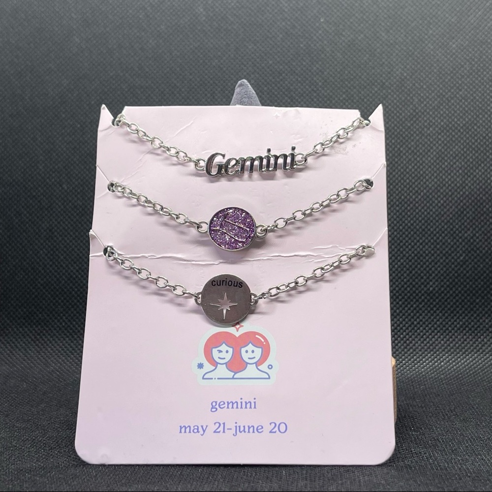 New. 3 piece Gemini necklace set!